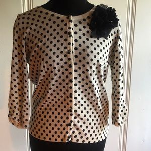 Polkadot cardigan sweater with flower corsage